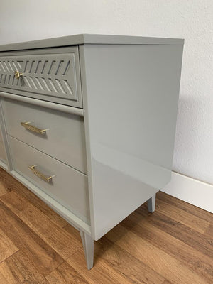 MCM mid century dresser with grey lacquer and polished brass hardware
